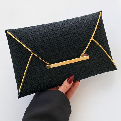 The Riviera Woven Envelope Clutch